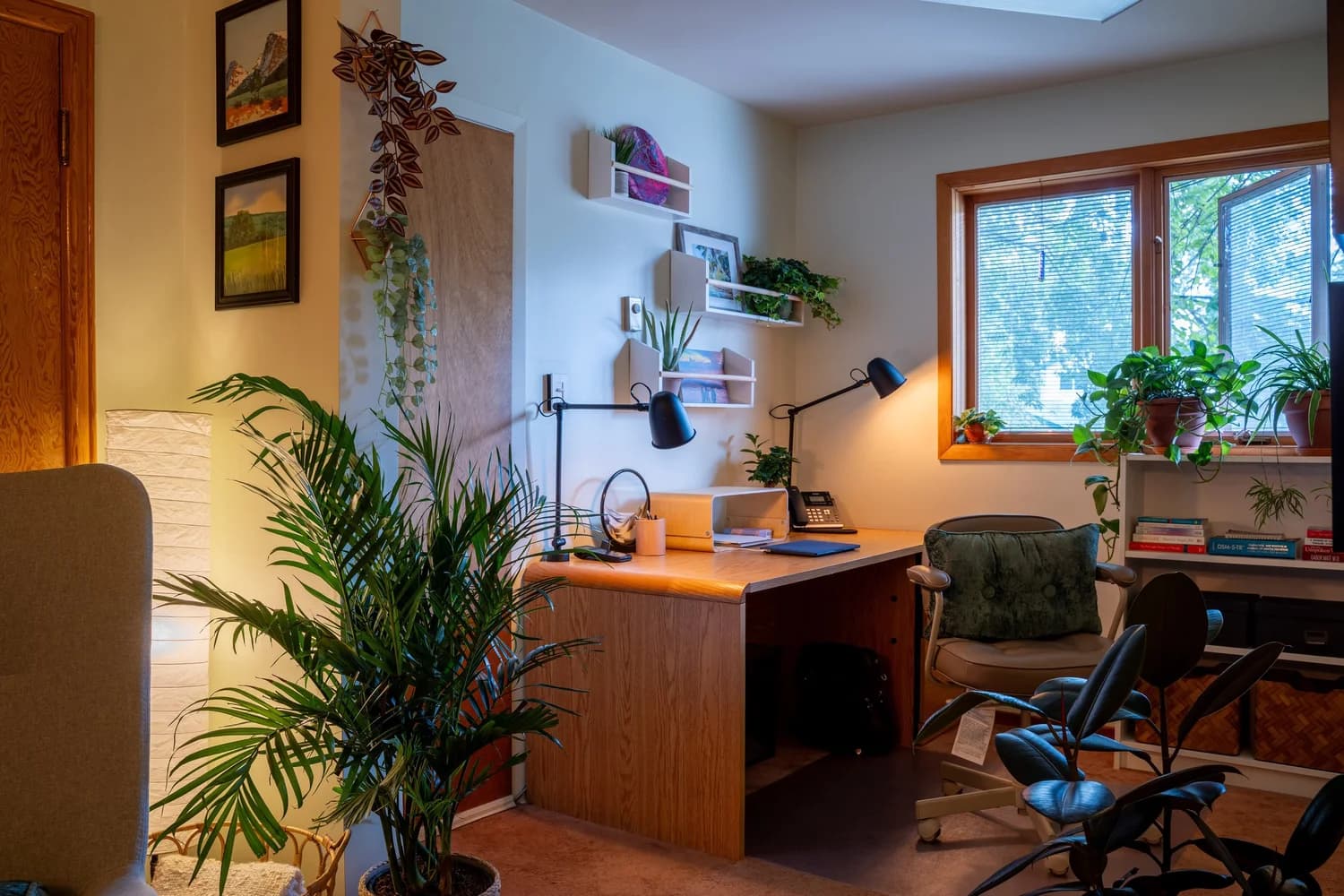 A calm, private home office set up for online therapy in Alberta
